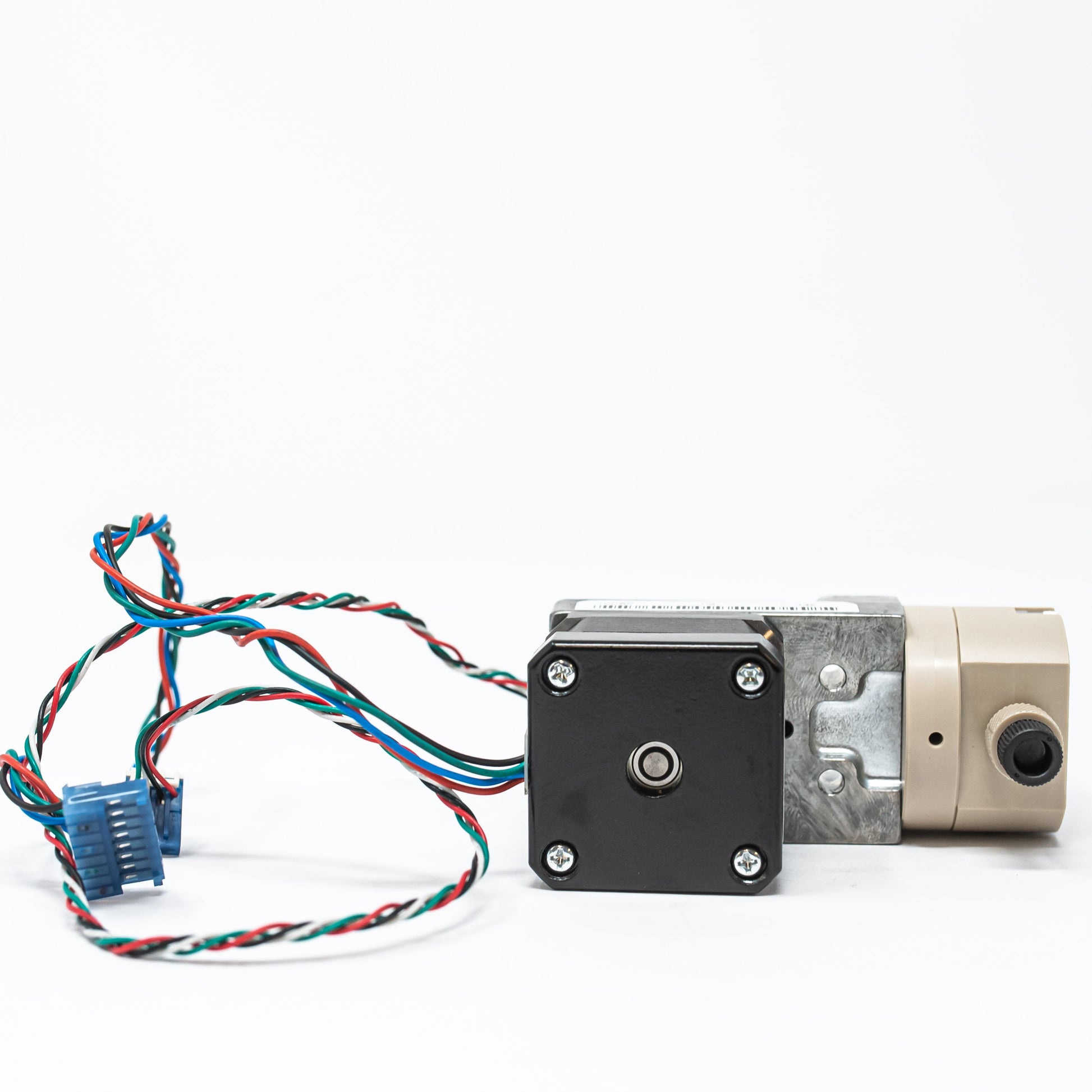 Single head positive displacement pump, stepper motor and optical switch