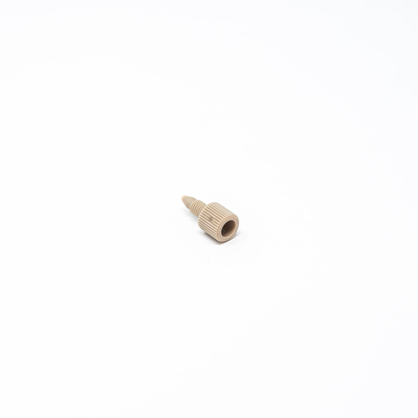 One piece finger tight nut and ferrule