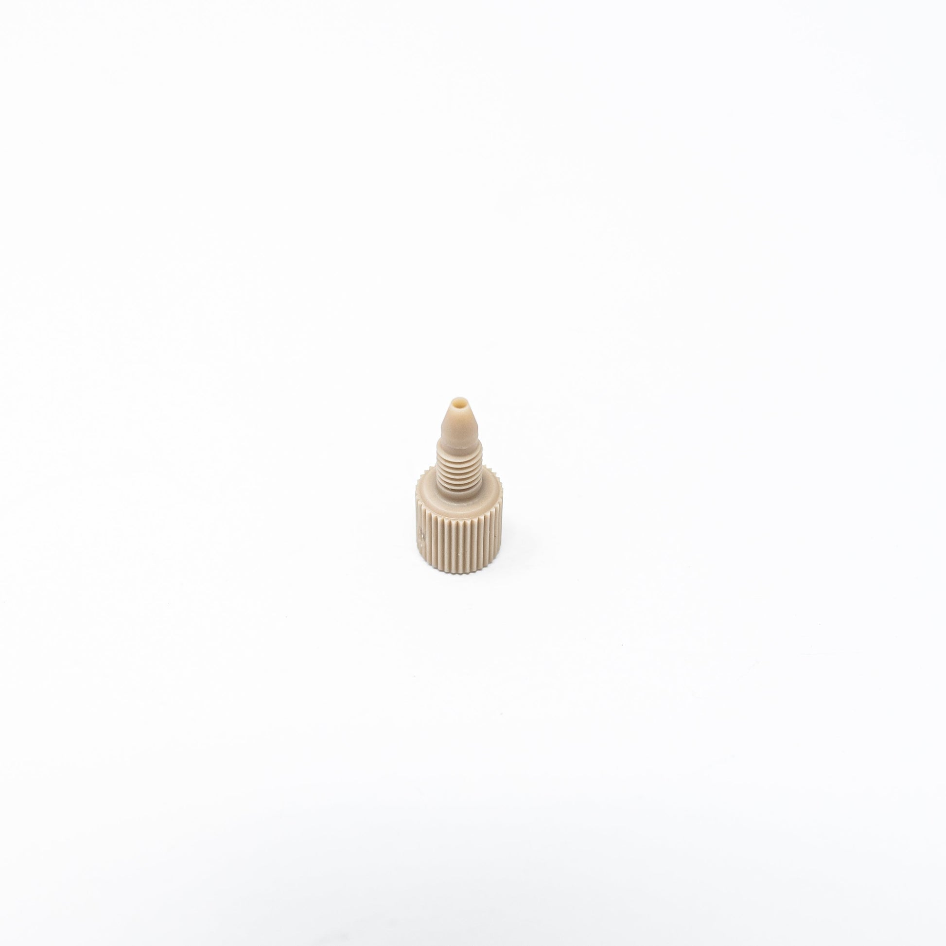 One piece finger tight nut and ferrule