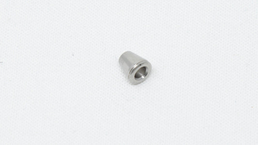 Cone shaped ferrule with hole in middle.