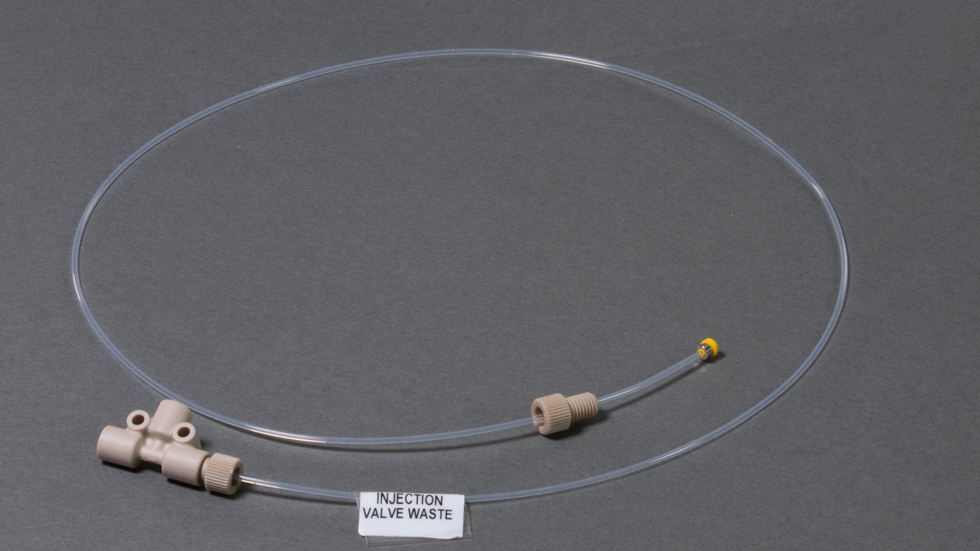 Auto injector long waste tubing assembly.  Includes 30 inches of PTFE tubing, PEEK tee, ferrules and nuts.