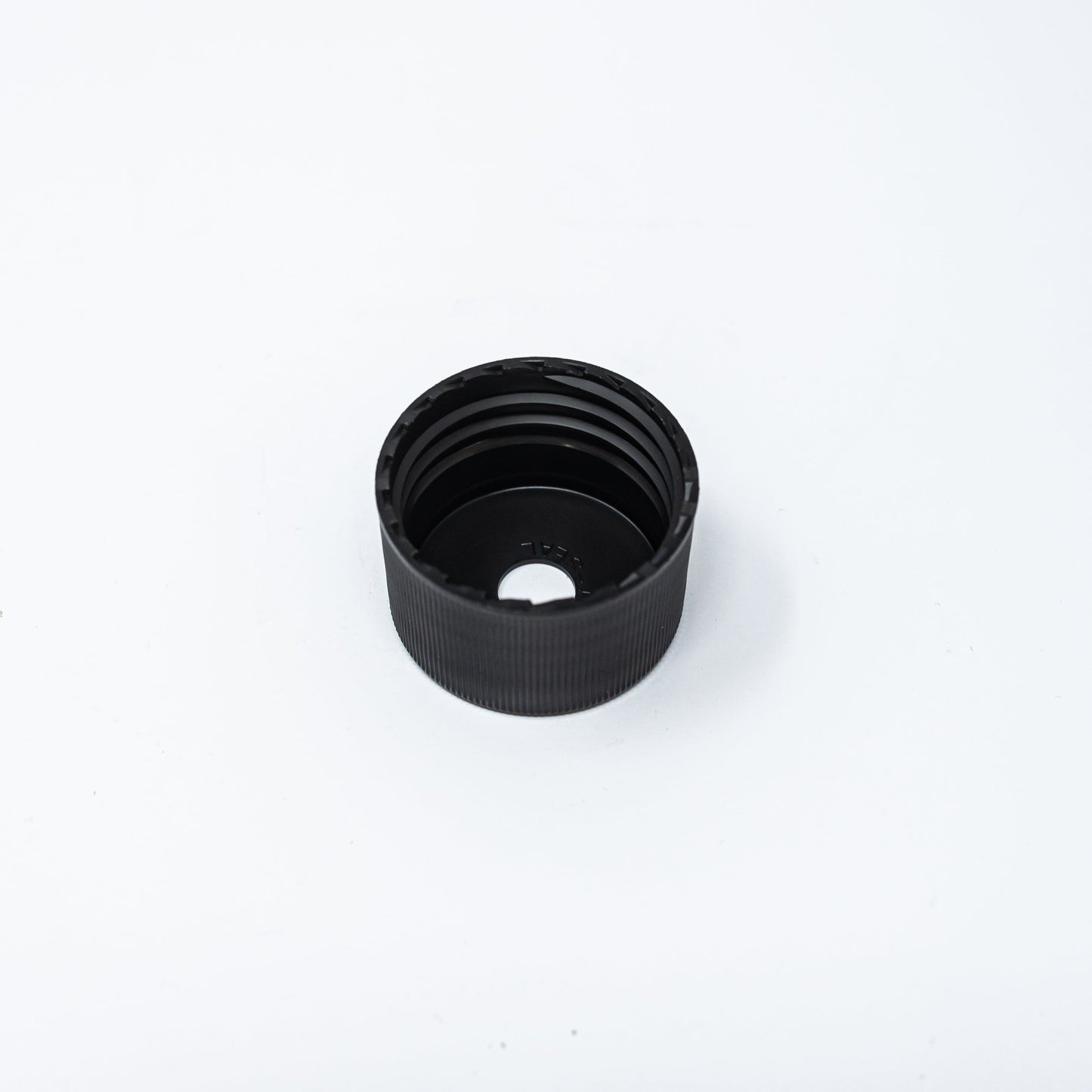 Black plastic bottle cap