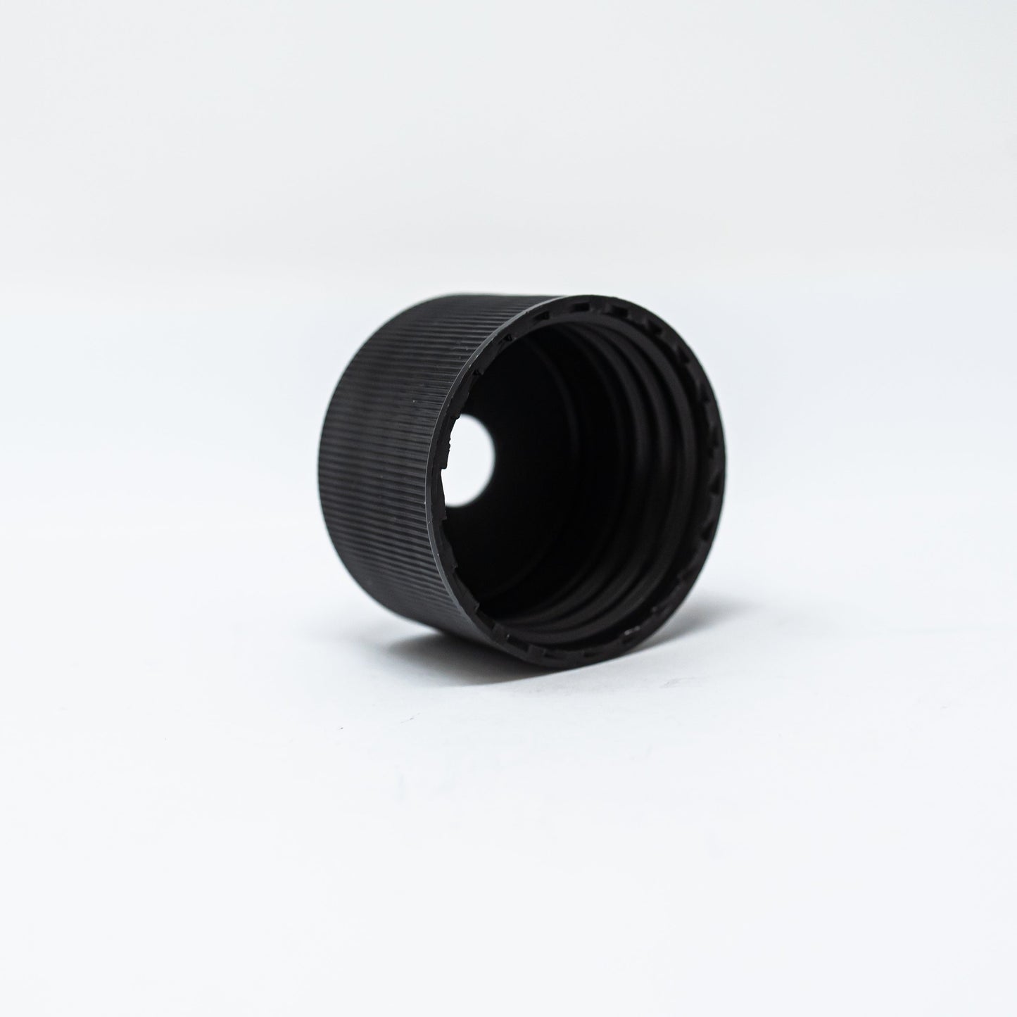 Black plastic bottle cap