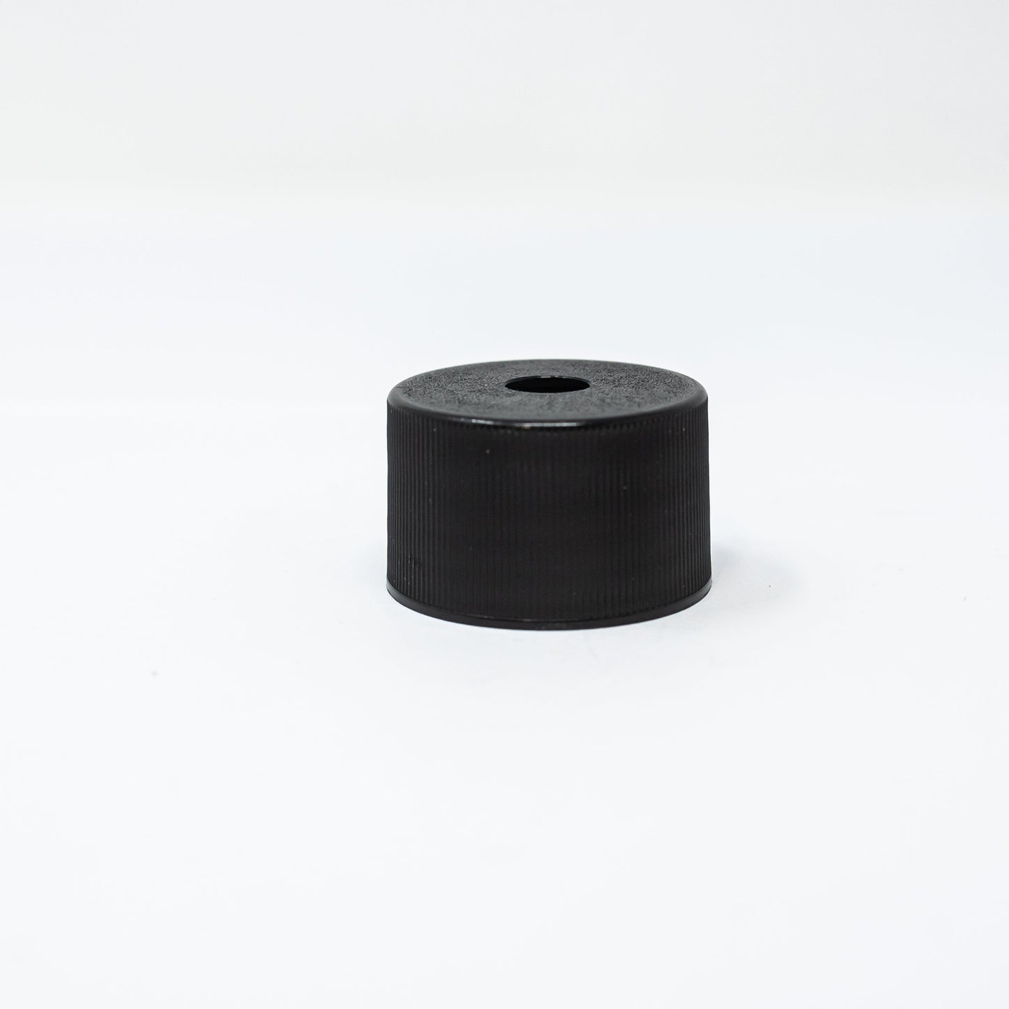 Black plastic bottle cap