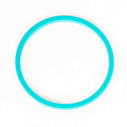 Aqua green round seal.