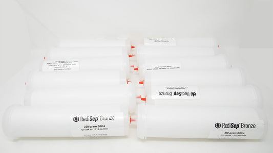 Several white tubes with black labels