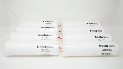 Several white tubes with black labels