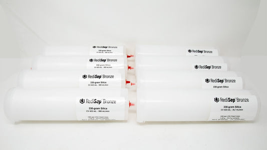 Several white tubes with black labels