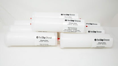 Several white tubes with black labels